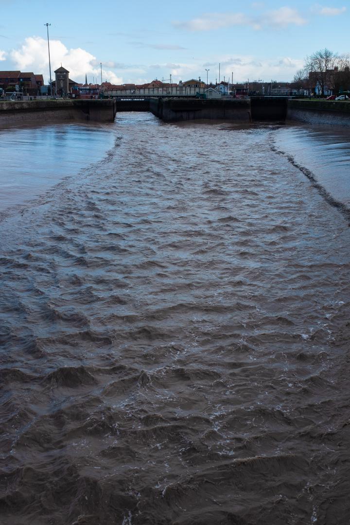 This is the next stage of the Cumberland Basin cleaning cycle. In the earlier pictures, you could see they'd emptied the basin. Now, with the Entra...