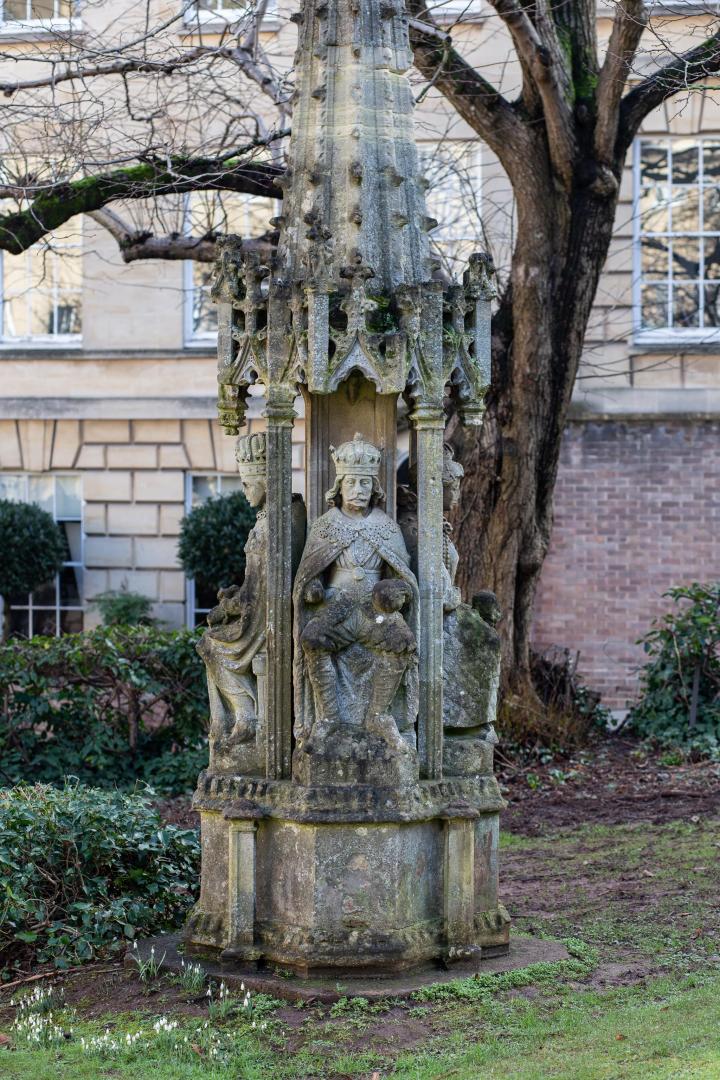 Very long story short: it's a cut-down replica of the Bristol High Cross. The original used to stand in the centre of Bristol, erected in 1373 to c...