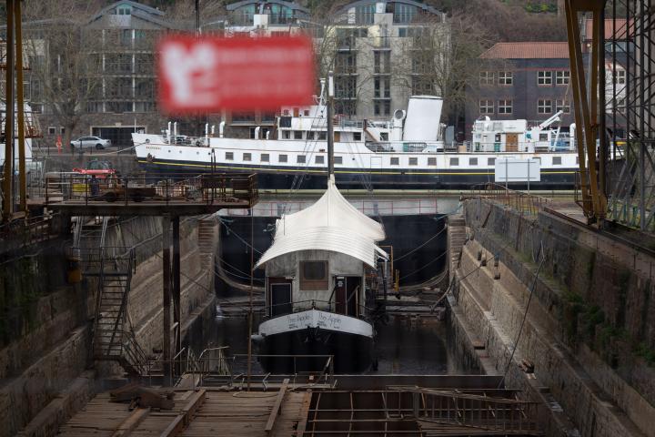 It's a floating cider bar, normally moored near Bristol Bridge, hence the name. It seems very small for the dry dock here. They once launched ships...
