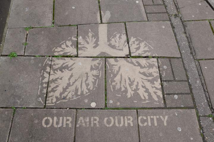 Clever: stencil out the pavement, then pressure-wash it, to make your point by highlighting the discolouration that's partly caused by airborne par...
