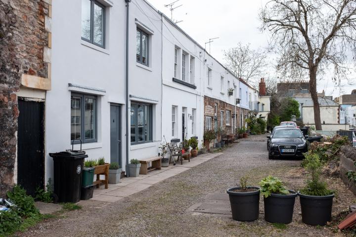 It's a lovely little mews, and looks very well-kept. I like the way that despite being fairly uniform in size and height that things are a bit more...