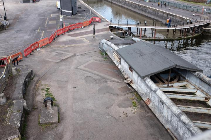 From up here it's easier to see the curving path that the end of Brunel's swing bridge would make along its little steel track, until it hit the wo...