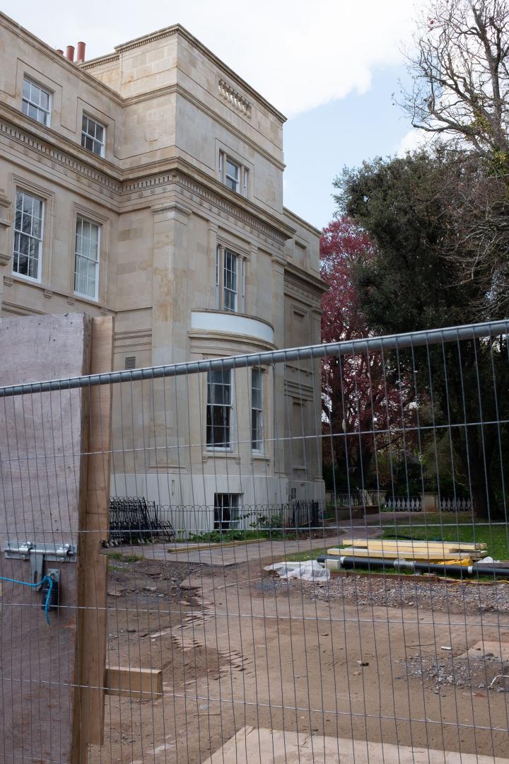 A peek through the building site railings at the back of Worcester House, the grand house at the end of Worcester Terrace.