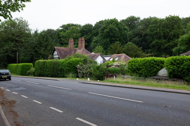 I guess it's more to reduce road noise than privacy, but it seems a shame these lovely-looking houses are all just peeping over giant hedges and wa...