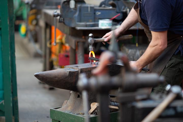 Talking of chains, I nipped back into the other half of the workshop building, where the forge lives, for a demonstration of chain-making. Here's a...