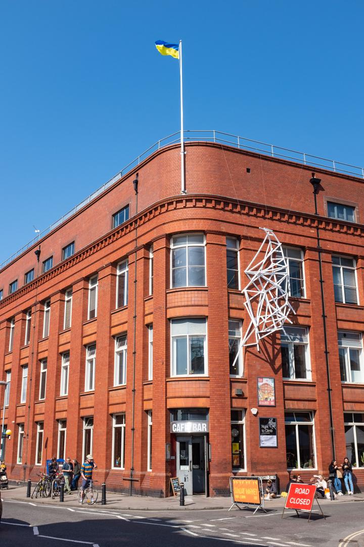 The Tobacco Factory is flying a different flag from usual. On the wall is Walid Siti's Right to Climb, which:


  is said to “express the positive...
