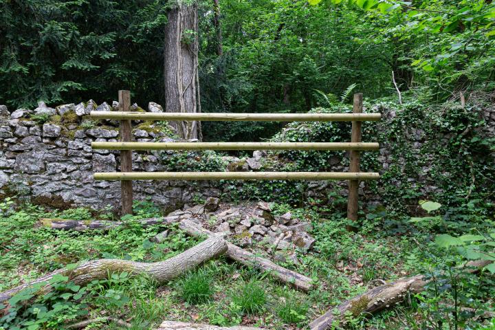 Possibly fenced off to stop people trying to clamber or mountain bike over it and cause more damage before it can be rebuilt?