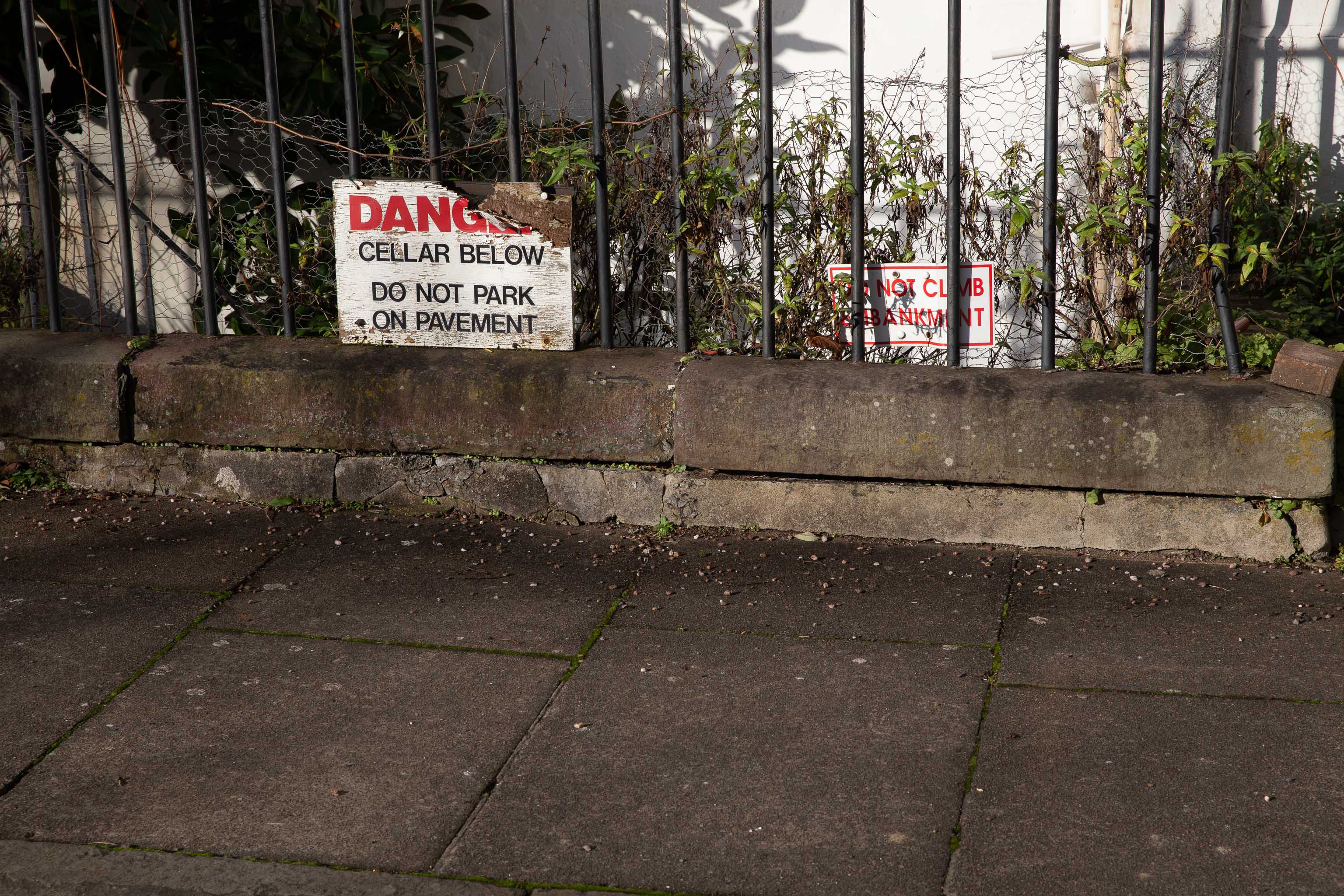 Danger
A month after I took this picture, a 40-foot sinkhole opened up inside the square's garden, along the edge of this side of the square, apparently i...