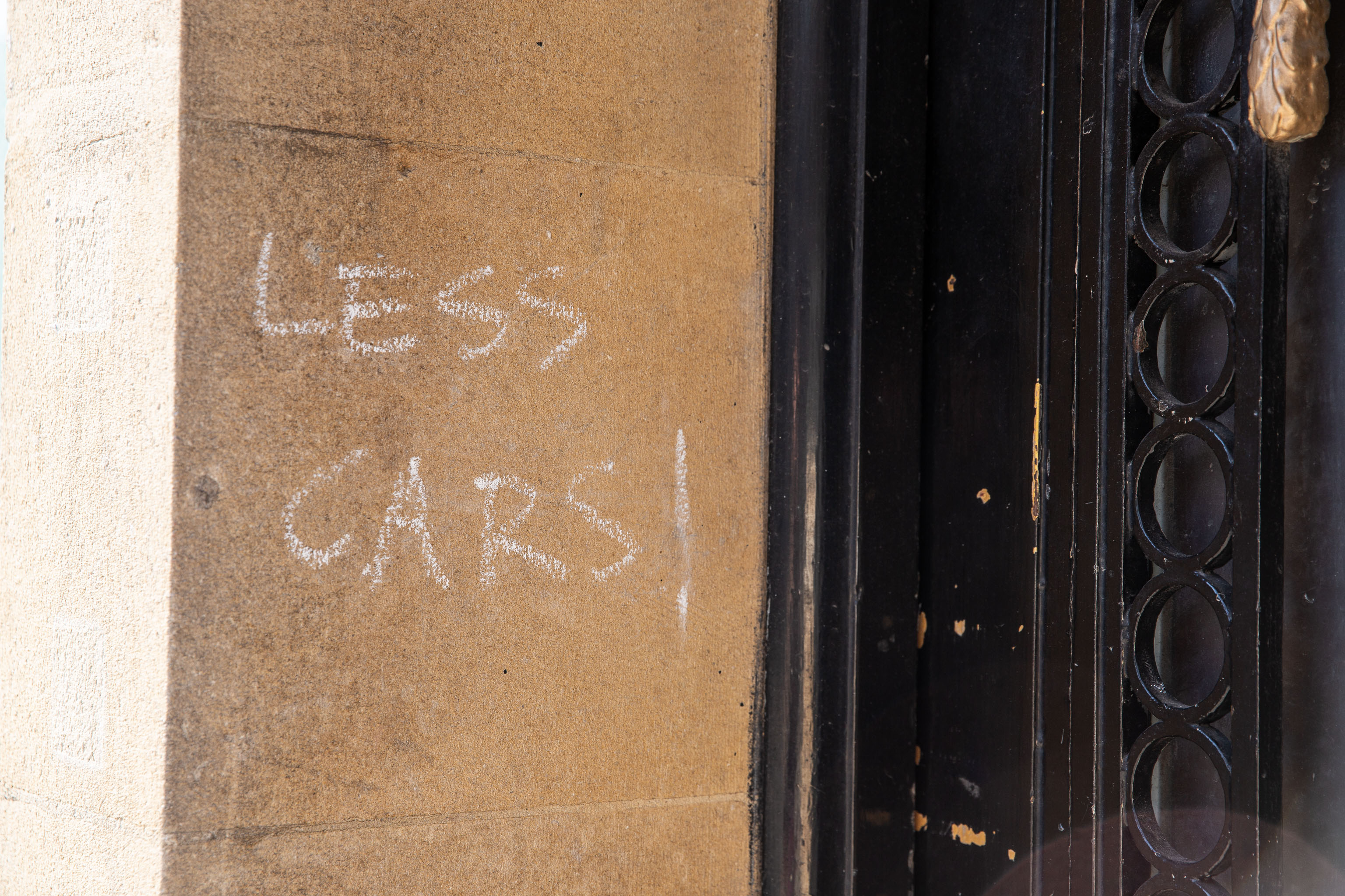 LESS CARS
If I'd had any chalk with me I'd've changed it to "FEWER"...
