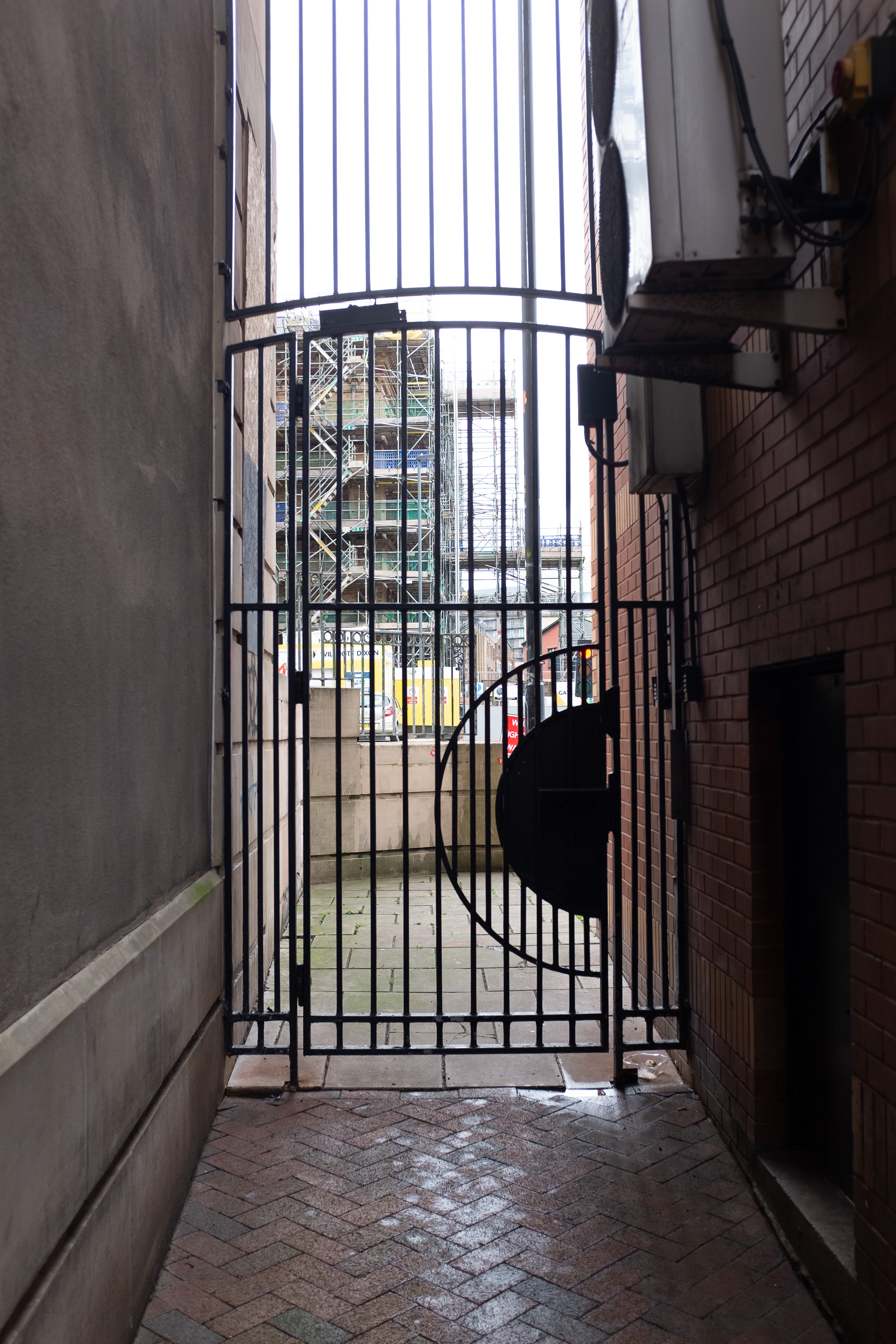 Gated
We're looking out onto the junction of Colston Street and Pipe Lane, between Amelia Court and an eaterie called Moroccan Corner.

We're a little bi...